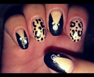 beige nails with black tips and leopard print and rhinestone accents! :)