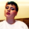 Smokey eye and berry colored lips.