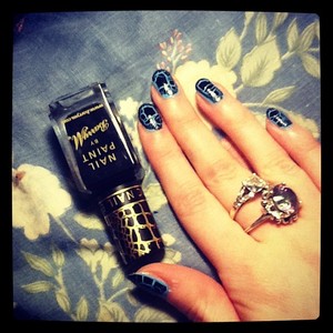 I used Barry M's "Blueberry Ice-Cream" as the base then used their "Croc Nail Effects" in black over the top.