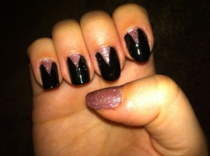 Black nails with pink glitter triangles