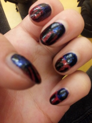 Paint your nails a rich red, put a glittery red over if wanted , and make a half moon of a shimmery rich blue, then lastly put a black crackle on the top to create that Spiderman web design! * I took this picture a couple days after I painted them so they look a bit worn !