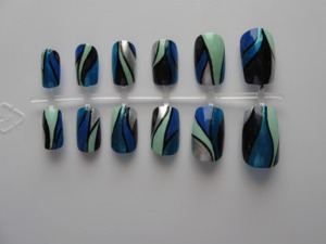 Buy them here: https://www.etsy.com/listing/106308776/blues-and-greens-abstract-nail-set