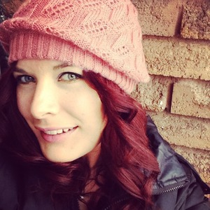Loving the red hair and a cute pink knit hat. I'm all about colour this winter! 