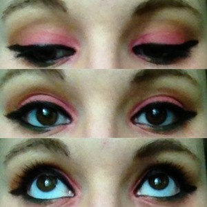 Pink eyeshadow, with brown in the crease, with green liner on the lower lid. Finish off with black liner on top lid and water line with black mascara 