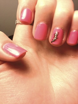 Gel manicure with feather detail