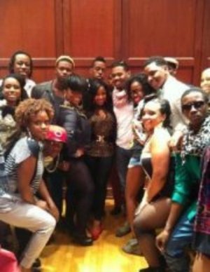 Toya Wright (Lil Wayne's ex-wife in the middle, n the reality star of Tiny and Toya,she's also n author. I;m on your left in the front with my natural curly hair n striped shirt w/grey harems. 