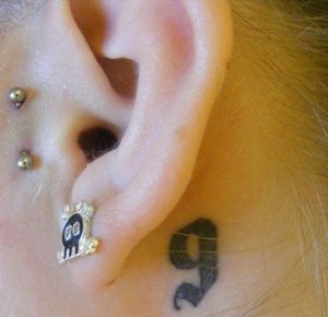 my (9) tattoo - (my birthdate)
Oh and my surface tragus pierced grew out :( might get it redone the right way one of these days :P