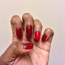 Red nails with black leopard print