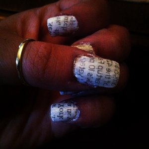 Pait nails white or a light color, cut ten strips of newspaper, press news paper ink down with a cotton ball soaked in rubbing alcohol for 10 sec.....
