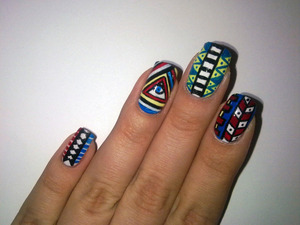http://​missbeautyaddict.blogspot.c​om/2012/03/​31-days-challenge-tribal-na​ils.html