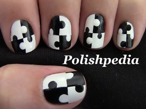 Black & White is back with this chic design!

Watch My Video Tutorial @ http://polishpedia.com/puzzle-nail-art.html