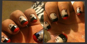 1. Nail colored bas polish (I think my color was called Milk or something)
2. Red tip (Don't worry if it's messy)
3. Black stripe (again, it's all right if it's messy)
4. With a dotting tool make silver paw prints
5. With a nail pen write out "TEAM JACOB"
6. Top coat :)