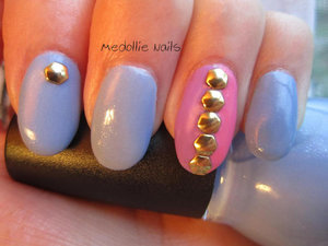 I used Sinful Colors in Voilets are Blue and on my fashion finger I used Essie Sittin Pretty and Revlon Bubbly.