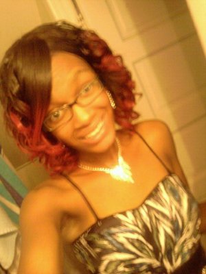 my homecoming hair style i did....All u need is a curling arn and some hair sprits.