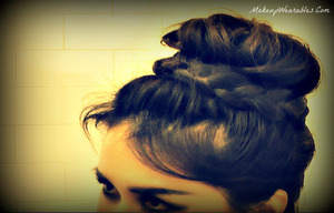 http://www.makeupwearables.com/2013/01/upside-down-braided-sock-bun-hairstyles.html
Learn how to do a romantic, cute, and messy, upside down braided sock bun  on your own hair,  for short, medium, and long hair.  Unique double lace braids!

Find me on YouTube - http://www.youtube.com/user/MakeupWearables
