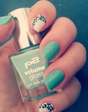 white and mint blue nails with leo look