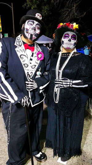 Mine and my BF's Day of the Dead makeup and costumes at our local Dia de los Muertos Festival downtown.
