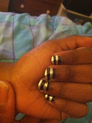Did the other mini me's nails today and this was her design request... Black was a little gunky so it's a lil messy