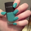 Green nail polish with blue undertones