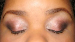 shadow primer 
gold on inner eye corner
peachish color on middle 
black on the outer edge. 
black liner an mascara 