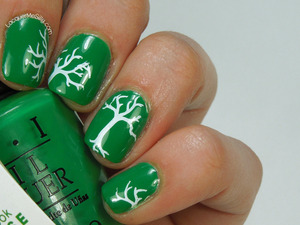 OPI Sandy Hook Green with tree branches stamped using Winstonia stamping plate. For more info please visit my blog post:  http://www.lacquermesilly.com/2014/02/08/stamping-saturday/