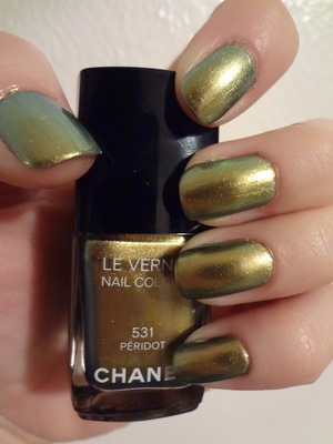Peridot by Chanel, a green/gold duo chrome polish..my camera does some serious injustice to this gem. A Christmas gift from the boyfriend :) <3