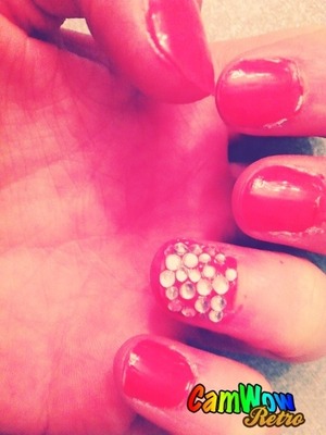 These are my nails one of them is covered in diamonds:) 