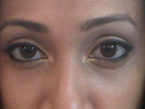 Subtle Day time eye makeup with gold highlights added to make it a night look