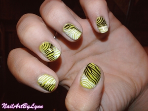 I painted my nails in a lime green colour and then added the zebra konad design from the m57 plate with two colours. for more designs and more info, check my blog: http://nailartbylynn.tumblr.com/