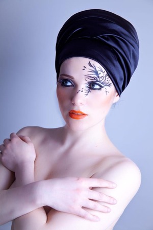 I designed this makeup, with the African head wrap, and photographed it. All hard work I did by myself. 