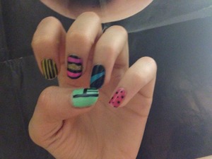 This is a colorful nail art I made and had a lot of fun making you should re create it and become creative