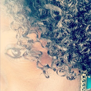 Love my curly hair and my brown eyes. 