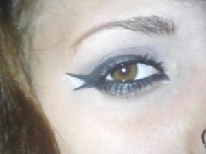 This Eyeliner lasted through doing the Marching Band Half Time Show durring an hellatious rain storm :)