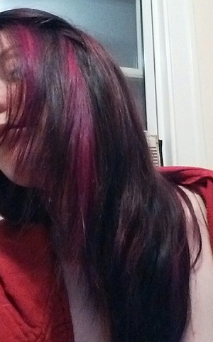 burgundy base colour, with fuschia peek-a-boo highlights. Done at home by me. 