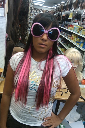 Goofing off in the hair store with my bestie