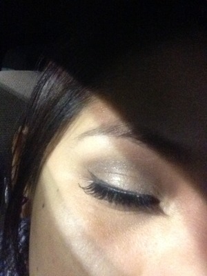 My liner thing with a wing also false lashes with night black shadow, and silver glitter eye shadow.