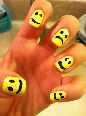 Inspired by Rihanna's amazing smiley face nails!
Colors: Sally Hansen Yellow Kitty, Sally Hansen Black Out