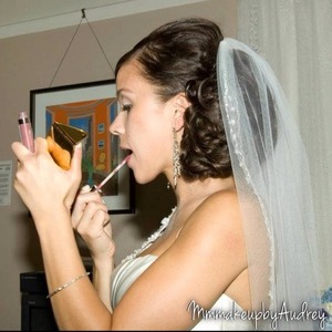 We tried everything dramatic for her wedding. We stuck with simple makeup to enhance her natural beauty.