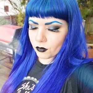 Hair extensions by VP Fashion.
Hair dye is "Electric Blue" by Special Effects.
Lips are Lime Crime Velvetines in "Black Velvet".
Lashes are Urban Decay Perversion Glitter Dip false lashes.
Eyebrow color base is Em Cosmetics eyeliner in "Turquoise".