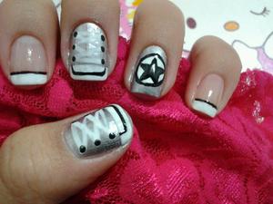 A good guy friend of mine who knows about my love for nails had suggested for me to do a converse sneaker nails. So this is what I came up with from the picture he send me.(: