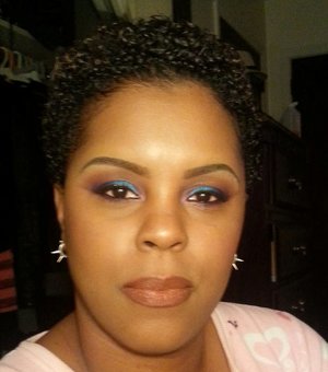 Blue and purple look with brown lips.