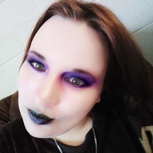 For this love I added the colors Purple and green and black makeup. The purple eyeshadow is really just purple lipstick. 