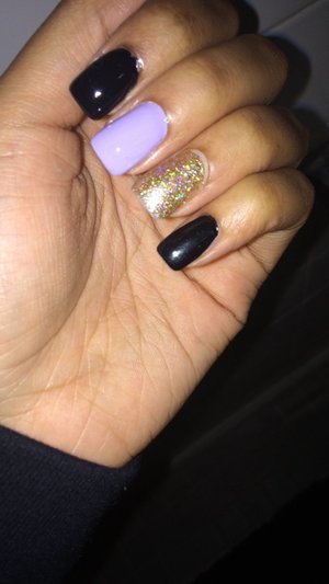 Same acrylic nails, but this time polished by me. I used a simple black and lavender nail polish and kept the gold sparkles. Fun look! 