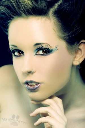 A look I did in 2010.

In case you're wondering, the "wrong" watermark name is my old screen name...

This picture was taken by Michael D., a brilliant local photographer. Of course this pic has been heavily altered and retouched, the makeup, however, is real (not digital).