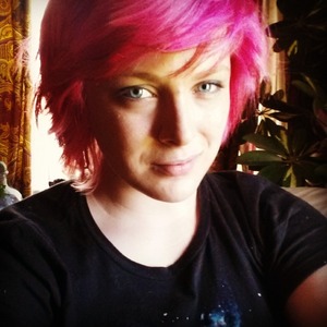 bright pink and red hair. 