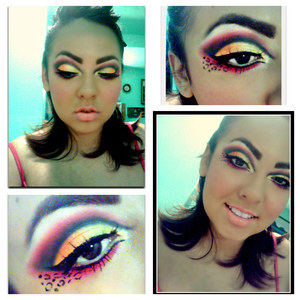 A Cut Crease with yellow orange red and pink. With leopard print.

Make sure to check out Glama Girls Cosmetics the have some AWESOME products!!! 
http://www.glamagirlcosmetics.com