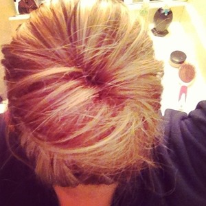 Did a sock bun in my hair! Very easy and cute!