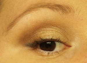 This was what I wore to my job interview. It is a light bronze eyeshadow that can just as easily be traded out for gold and a gray eyeliner. The gray is less harsh than black. It is paired with light eyebrows, black mascara, and a nude pink lip. 