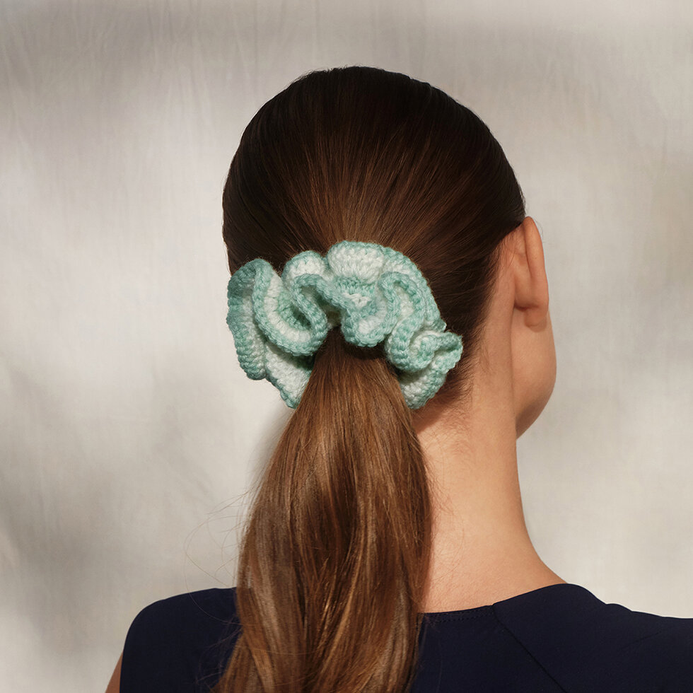 Model wearing Kitsch Crochet Scrunchie in Blue