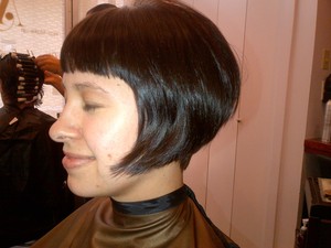 Short and sweet...new baby, new bob!  Much of the cut was done with a Carving Comb from Paul Mitchell.  All-over color with Shades EQ 03NB. Love my job!